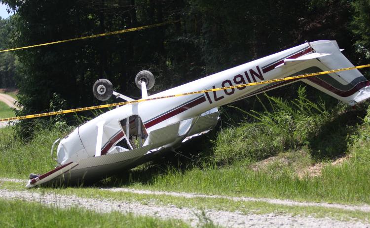 A plane flown by an Abbeville, South Carolina resident crashed off the end of the Elbert County Airport after a mechanical issue prevented the pilot from clearing the treeline. Airport Manager Randy Haralson said there were no injuries, but the plane was totaled. (Photo by Wells)