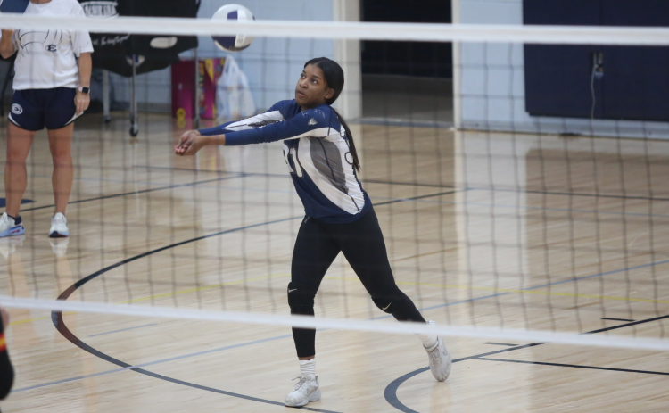 Volley Devil senior De’Asia Kinsey bumps the ball during Elbert’s 2-0 loss to Clarke Central Sept. 19. (Photo by Wells)