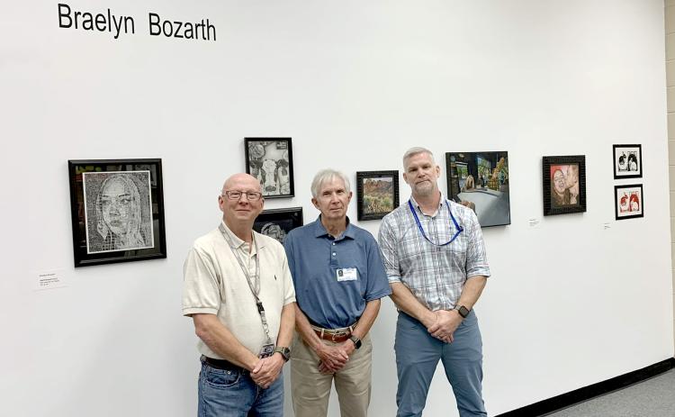 Elbert County Comprehensive High School recently unveiled the Bennett-Jossey Art Gallery in the school library as a place to display student work. Pictured are the gallery's namesakes and longtime art teachers (L-R) David Bennett and Joe Jossey and current art teacher Lee Wells.