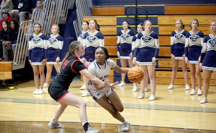 Right, Kaylen Rucker cuts to the basket during Elbert’s loss to Rabun in the Inferno Jan. 19. (Photo by Wells)