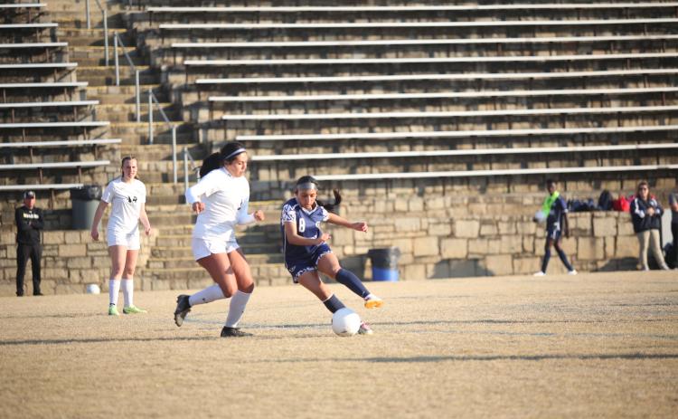 The Devils and Lady Devils soccer teams are scheduled to kick off the new Spring Sports season with a scrimmage against Lincoln County in the Granite Bowl Feb. 2. (File photo by Wells)
