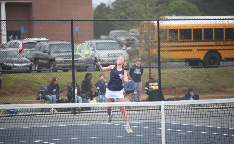 Lady Devils Jude Sanders, Emily Poon and Katie Nguyen led the Lady Devils tennis team to a third-place finish in the Region 8A Division 1 tournament hosted by Elbert at Elbert County Middle School April 8 through April 10. The Lady Devils beat Commerce with a win from Sanders in the last match of the day, which extended Sanders’ winning streak to 14 straight matches. (Photos by Wells)
