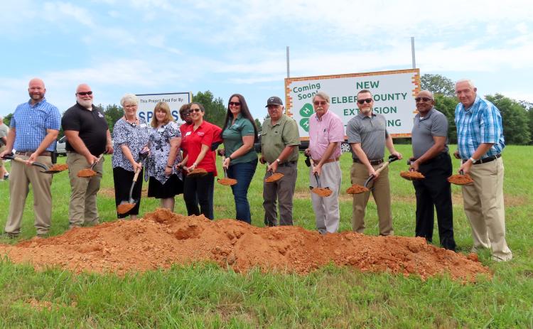 Getting their shovels moving during the ground-breaking cermony on May 24 are County Administrator Allen Hulme, Agriculture/Natural Resources Agent Brian Bradford, Family and Consumer Science Agent Christa Campbell, Administrative Assistant Trisha Willis, Office Assistant Homerzell Heard, Program Assistant Sophie Walsky, 4-H Agent Lauren Dye, Commissioner Chris Alexander, Commissioner Casey Freeman, Commission Chairman Lee Vaughn, Commissioner Freddie Jones and Commissioner David Hunt. (Photo by Weeks)