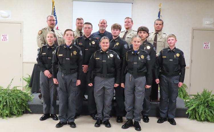 Explorer Academy Post 746 graduates and training officers include (front row L-R) Cad. Brantley Mattox, Cad. Merci Mooney and Cad. Lexi Moon. (Middle row) Cpl. Annabelle Anderson, Sgt. Brody Mattox, Cpt. Edwin Crowe, Cad. Trace Atkins and Cad. Chevy Bailey. (Back row) Cpl. John Rice, Sgt. Noah Hart, Chief Deputy Darren Scarborough, Cpl. Zach Johnson, and Cpl. Jayden Robinson. (Photo by Weeks)