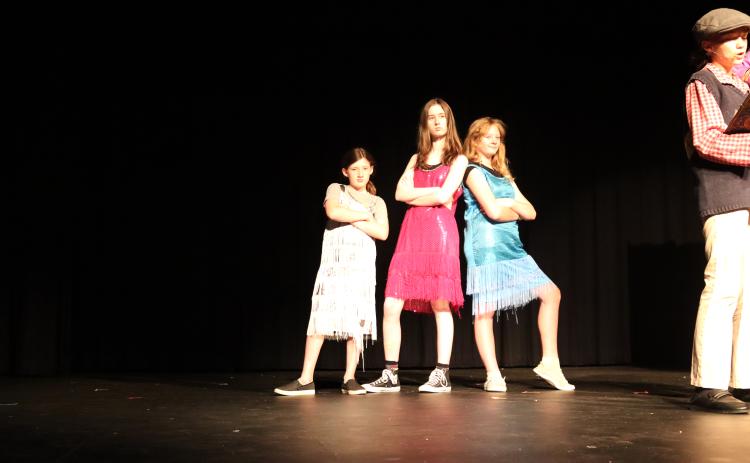 (L-R) Sixth grader Ariana Perez Velasco, sophomore Faith Gailey, and sixth grader Merida Blackston perform "Shake it Up" during the Elbert Theatre's presentation of  "James and the Giant Peach."  The musical, which  is based on the 1961 book of the same name by Roald Dahl, was part of the Elbert Theatre Foundation's summer youth program. (Photo by Weeks)