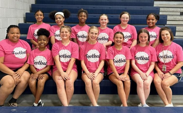The ECMS football cheerleading squad includes (front row, L-R) Coach Dishae Blackwell, Myla Hood, Matylee Brown, Liberty Rousey, Presley Bellew, Sequoia Singleton and Coach Jamie Keblish and (back row, L-R) Jolee Ainsworth, Surrender Goings, Kenjia Davis, Piper New, Claire Moon, and Charity Oglesby. (Photo submitted by Jamie Keblish