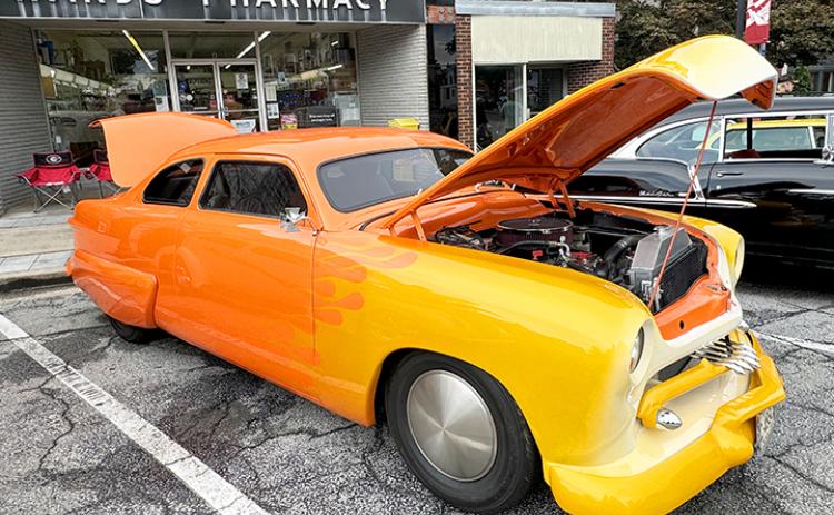 Over 60 car enthusiasts entered Main Street's Cruise-in and Classic Car Show Saturday,  July 20 in Elberton's downtown public square. Cars ranged from restored and "like new" to "improved and empowered" like this 1950s Ford Custom.