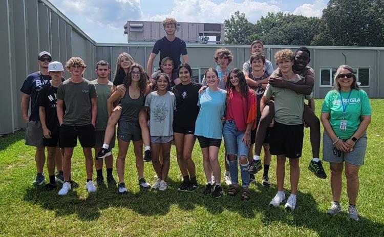 The 2024 Devil and Lady Devil Cross Country teams include Ezra Adamson, Eli Alexander, Brody Baker, Michael Beahringer, Landon Bowman, Devisha Desai, Mason Dove, Kinsley Duke, Ava Dunbrack, Samuel Gailey, Linda Garcia, MaKaylie Harris, Alexandra House, Anthony Linares, Colton Mabry, Yamilet Martinez, Grant Owens, Kennedy Ray, Ronny Medellin, Rilee Rucker, Brantley Smith, Dakota Toole, Samantha Walsky and Mitchell Wheeler. (Photo submitted by Kyle Ashworth)