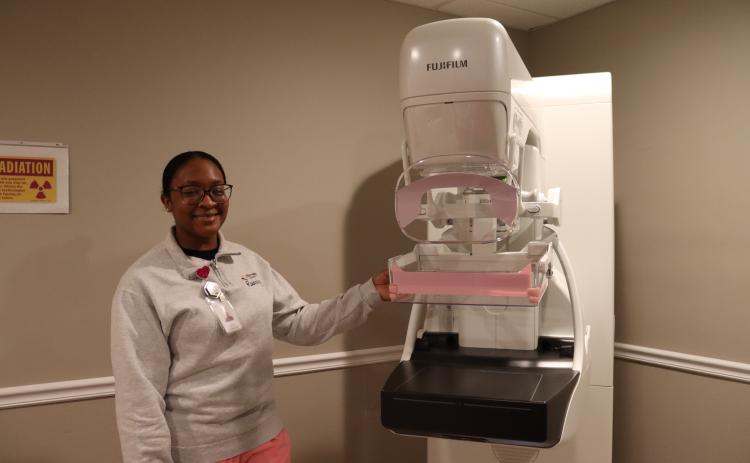 Mammography technician Alayjah Sammons shows the new Fuji Cristalle mammography machine at Elbert Memorial Hospital. (Photo by Weeks)