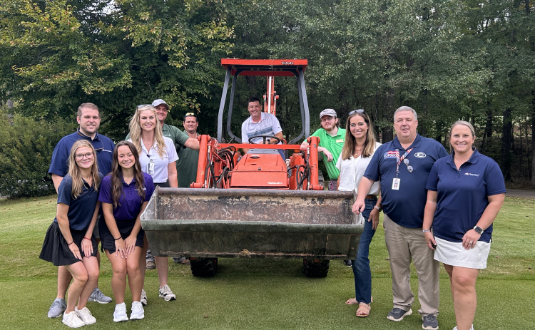 Elbert Memorial Hospital staff and Richard B. Russell State Park staff pose for a picture prior to the golf ball drop. (Photo by Mark Wells)