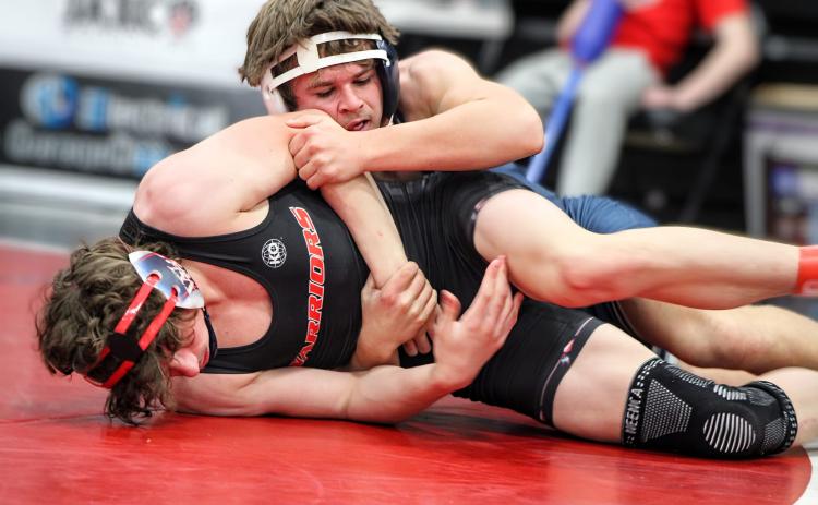 Brycin Hughes controls his opponent’s arm during the Panther Invitational Dec. 7. (Photo courtesy of April Dixon Hughes and Blue Devil Wrestling)