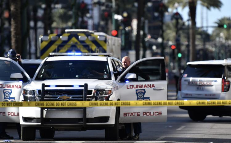 Louisiana State Police and local New Orleans agencies blocked the French Quarter's Bourbon Street as well as its intersection with Canal Street. Multiple explosive devices were found in the area and rendered safe. (Photos by Wade Cheek/CNI News Service)