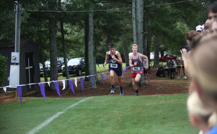 Eli Alexander (left) was Elbert’s top finisher at the Northeast Georgia Cross Country Championships Aug. 16. (Photo by Bo Underwood)