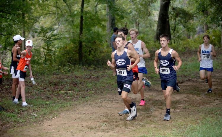 Dakota Toole (left) and Eli Alexander (right) competed in the Athens Academy home meet hosted by the Spartans in Athens Sept. 6. (File photos by Bo Underwood)