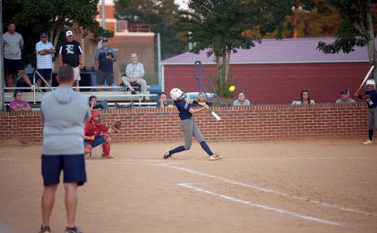 Bryleigh Dickerson hits her second of two home runs during Elbert County’s 15-0 win over Oglethorpe. (Photo by Bo Underwood)