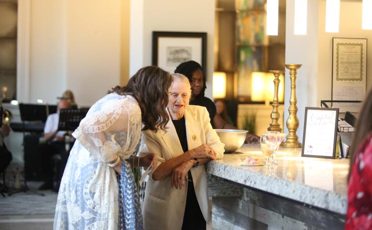 The City of Elberton hosted a gala at the Samuel Elbert Hotel to celebrate the 100th anniversary of the historic Elberton hotel. The event celebrated the anniversary with food, live music and a presentation from local historian Joyce Davis (above left) about the hotel's history. (Photo by Mark Wells)