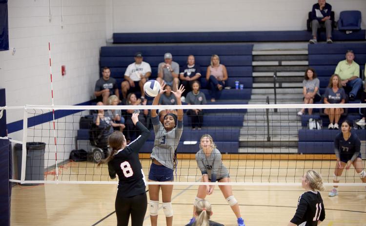 Anaja Banks (3) goes up for a block against Rabun County.  (File photo by Bo Underwood)