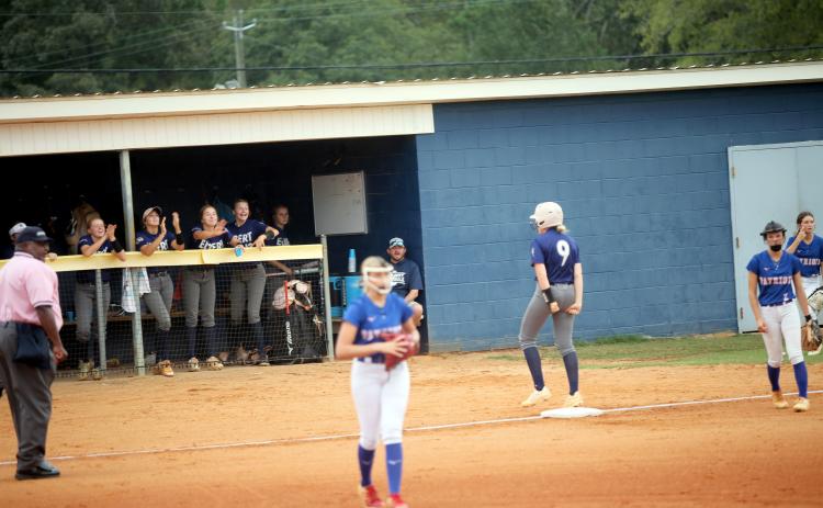 Audrey Lunsford (9) celebrates a triple against Oglethorpe. (Photo by Bo Underwood)
