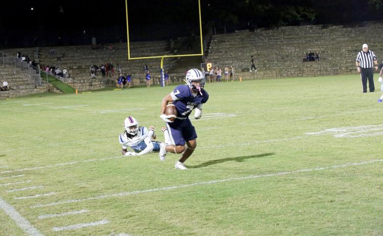 Jose Rodriguez (7) leaves a defender in the dust against PCA on Oct. 3. (Photo by Bo Underwood)
