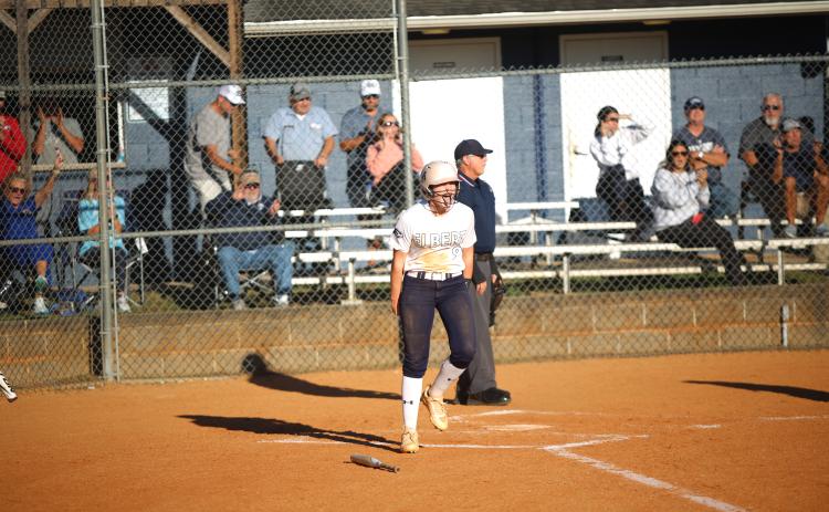Audrey Lunsford celebrates a run. (File photo by Bo Underwood)
