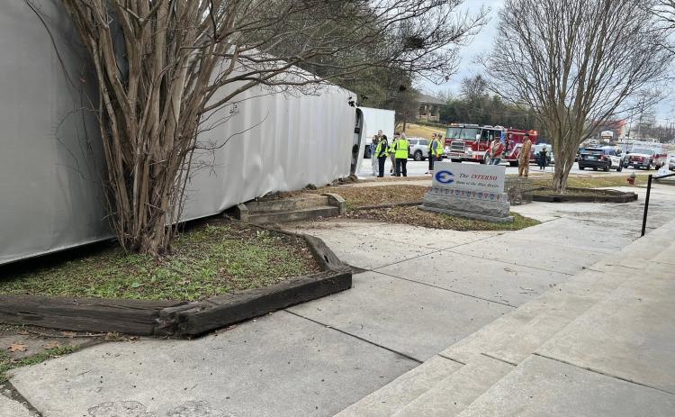 A truck overturns in front of the Inferno. (Photo by Mark Wells)