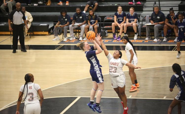 Audrey Lunsford pulls up and lets a mid-range jumper fly. (File photo by Mark Wells)