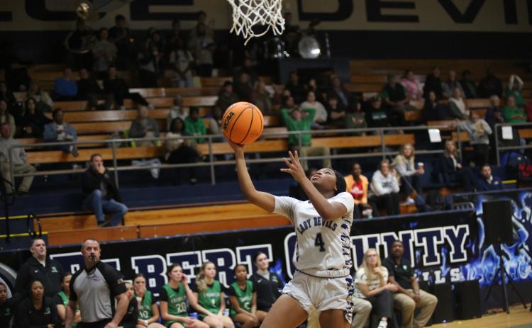 Kaylen Rucker (4) lays the ball up. (File photo by Bo Underwood)