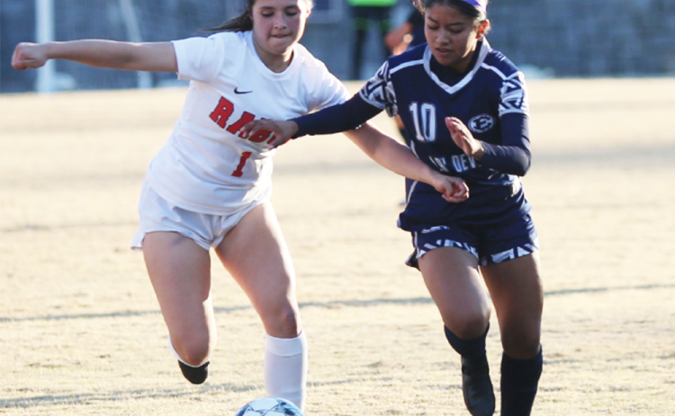 Kimberly Hernandez fights for the ball during a game against Rabun last season. (File photo by Mark Wells)
