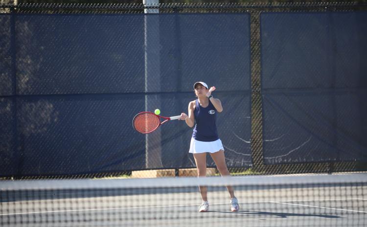 Emily Poon (first slide) and Gracie Kidd (second slide) played their final matches as Elbert County Lady Devils last Tuesday. (Photos by Bo Underwood)