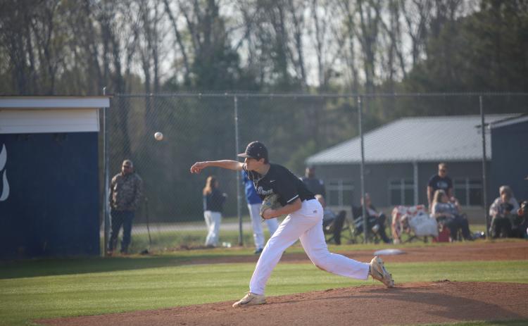 Brody Baker lets a pitch fly. (Photo by Bo Underwood)