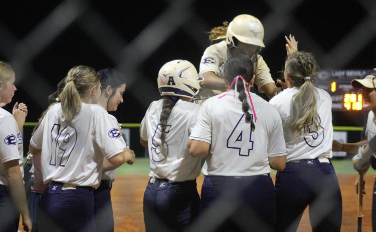 Nakiya Dubose celebrates her second home run against Callaway at home plate. She drove in three of Elbert's six runs in the second game.