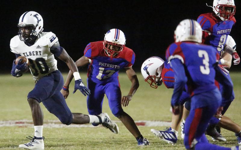 Junior running back Tonarrio Fortson rushes in the fourth quarter of Elbert’s away region game at Oglethorpe County Friday night. (Photo by Cary Best)
