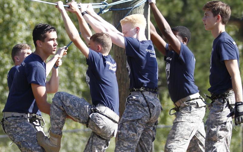 Elbert County JROTC Male Raiders team members (L-R) Logan Vickery, Briley Jenkins, Grady Thomas, Jordan Teasley, D.J. Veal and Nicholas Smith compete in the rope bridge event during a meet at Jackson County High School Sept. 21 in Jefferson. (Photo by Cary Best) 