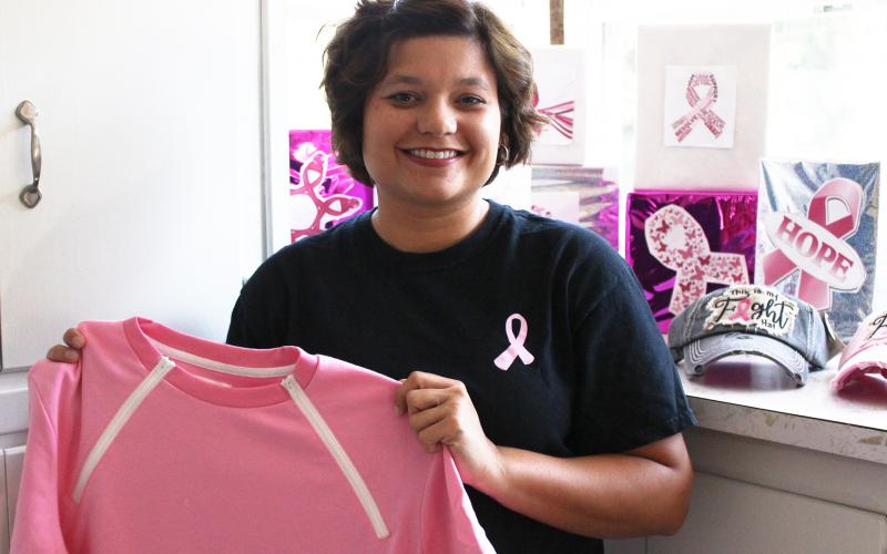 Jenny Jenkins, a survivor, is opening  a boutique for women who are fighting cancer. She says at the same time, she wants to make them beautiful. (Photo by Scoggins)