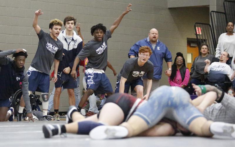 Mat Devils (L-R) Jamal Rucker, Alberto Cervantes, Jake Keblish, Tyshawn Hughes and Marty Bailey react to senior Brice Noggle getting a pin during Elbert County’s 34-27 win over Oglethorpe County during the Area 6-AA Dual semi-finals Jan. 11 at Jasper County High School in Monticello. (Photo by Cary Best)