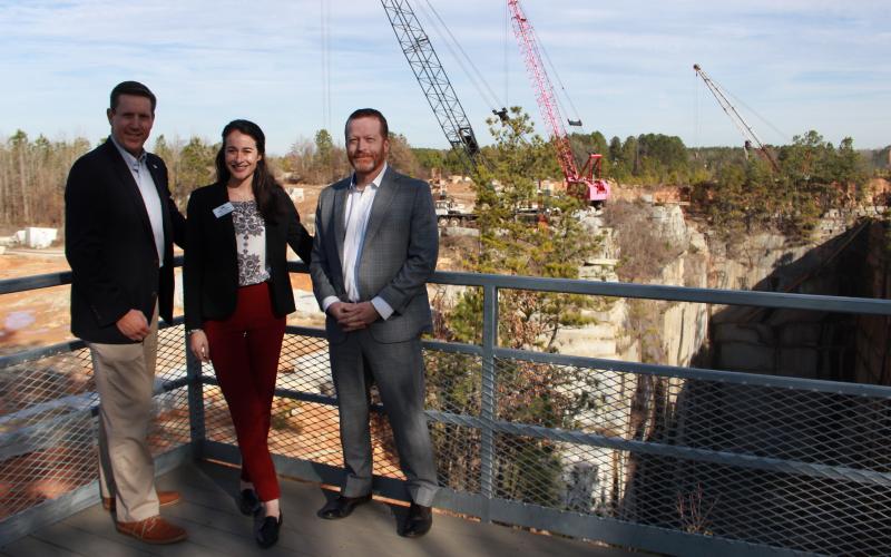 EGA Executive Vice President Chris Kubas, Elbert County Chamber of Commerce President Leslie Friedman and BOC Chairman Lee Vaughn stand on the viewing platform over Pyramid Quarry on Monday, Feb. 3.