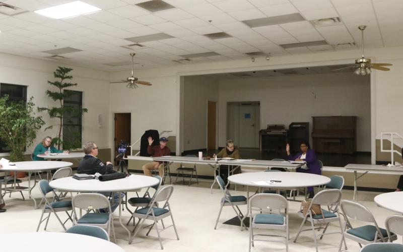 The Bowman council practiced 'social distancing' at its meeting at the Bowman Community Center Monday night. (Photo by Scoggins)