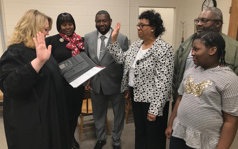 Probate Judge Stephanie Hewell performed a swearing in ceremony last week for new Bowman Council Member Henrietta Williams. Shown are (L-R) Hewell, Williams’ daughter-in-law and son Tanzie Allen and Charles Allen Jr., Williams, Williams’ son Chadwick Allen and Williams’ daughter Kyra Holland. (Photo by Jones) 
