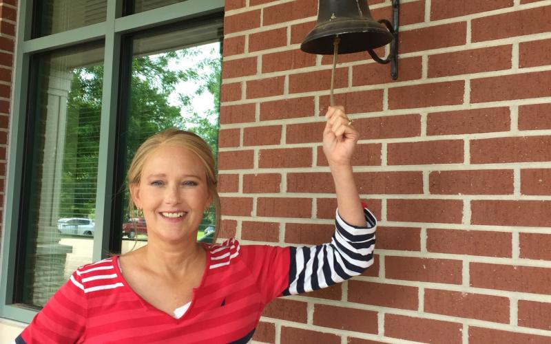 Ringing the bell ... Kelly Gary said she ‘felt so loved’ during a two-year process that allowed her to beat breast cancer. 