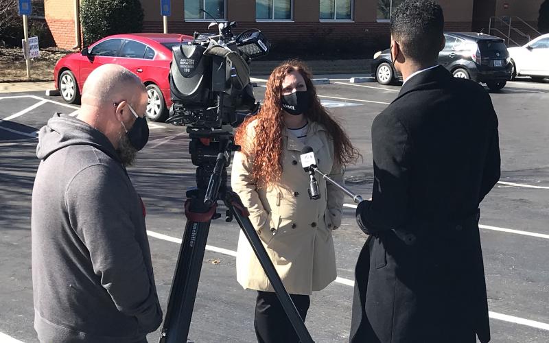 The Medical Center of Elberton's Practice Administrator Brooke McDowell talks to a WYFF 4 camera crew outside The Medical Center Thursday afternoon. (Photo by Jones)