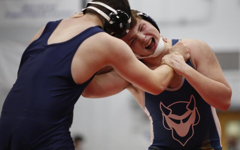 Josiah Harkins grapples with his opponent from Glenn Hills Jan. 15 during the 5AA Area Duals at Oglethorpe County High School in Lexington. (Photo by Scoggins)