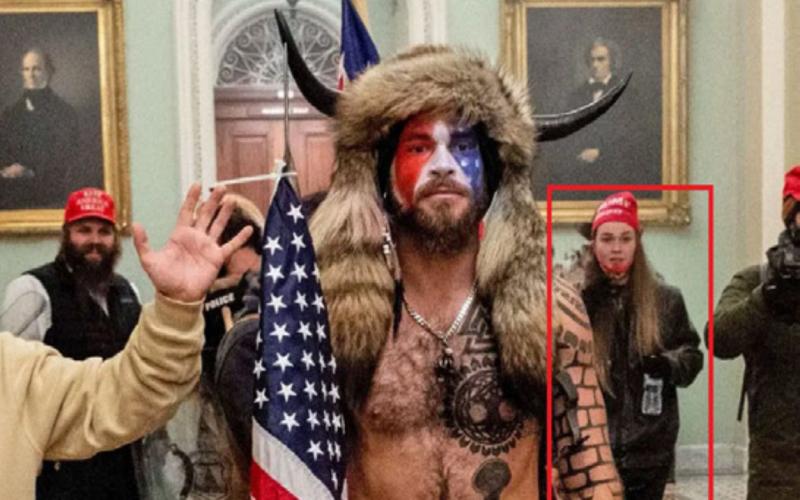 The Federal Bureau of Investigation’s “statement of facts” says federal authorities have “probable cause” to believe that Savannah Danielle McDonald is shown in this Jan. 6 photo with Jacob Chansley, better known as the “QAnon Shaman,” in the U.S. Capitol Building. The FBI included this photo with its statement of facts announcing the arrest of McDonald of Elberton and Nolan Harold Kidd of Crawford. The federal agency added the red box in the photograph to identify McDonald. (Photo provided by FBI)