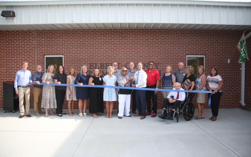 Pictured during the July 19 ribbon cutting at Elbert County Primary School are (front row, L-R) Josh Atkinson of Carroll Daniel Construction, Jon Jarvis, Amanda Lucas, Rebecca Long, Haley Oakley, Susan Fortson, Hannah Williams, Christy Hart, Theresa Barnett, Robert Wheeler, Kam McClary, Heather Nestor, Phillip Hart, Pamela Eaves, Patricia Graham and Bridgette Matthews and (back row, L-R) Keith Harper, Mike Turner and David Hunt. (Photo by Wells)