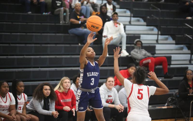 Zoe Evans lets a three points shot fly duiring the game against Wade Hampton. (Photo by Wells)