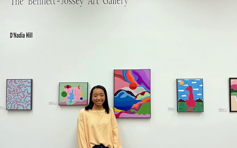 Senior D'Nadia Hill's artwork headlines the newest installation of the Bennett-Jossey Art Gallery in the media center at Elbert County Comprehensive High School. 
