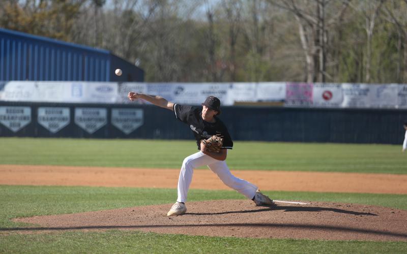 Brady Bowen lets a pitch fly from the mound during the game against the Eagles. (Photo by Scoggins)