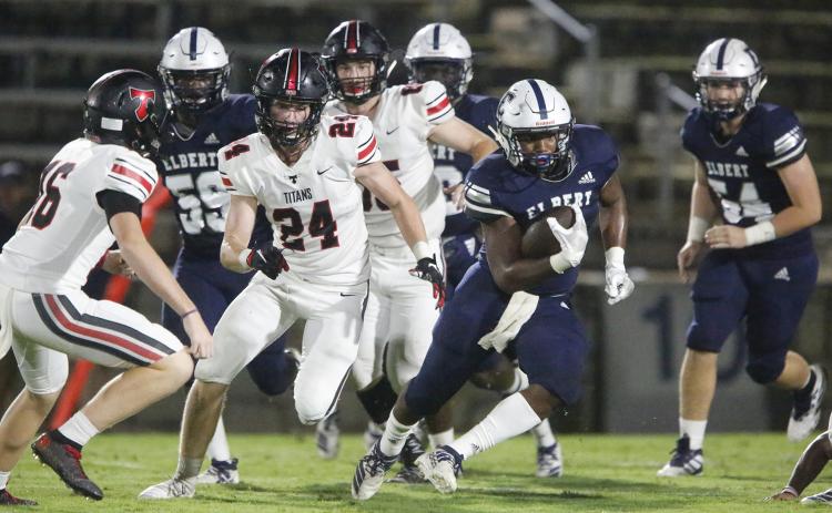 Blue Devil junior running back C.J. Tate returns a kickoff to the 44-yard line in the second quarter in Elbert County’s 28-24 home loss to North Oconee Sept. 13 in the Granite Bowl. (Photo by Cary Best)