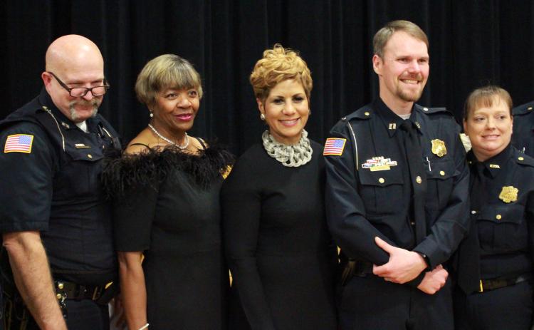 Posing with MLK Committee Founding Chair Mary Clark and Keynote Speaker Justine Norman Boyd were members of the Elberton Police Department: (L-R) Captain John Curlee, Clark, Boyd, Captain Joseph David and Elberton Police Department Office Manager Christy David. (Photo by Scoggins)