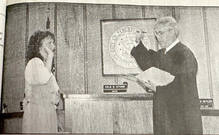 Chief Magistrate Judge Lanie Simmons (left) was sworn in by former Superior Court Judge John H. Bailey Jr. after being appointed to the position in July 1996. Simmons finished the remainder of former Chief Magistrate Marie Dewberry’s term and has been elected to six consecutive four-year terms. (Photo from the July 17, 1996 edition of The Elberton Star)