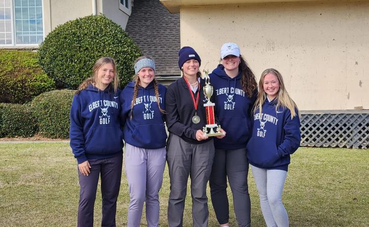 The Lady Devils golf team finished in first place in the Cougar Invitational at Mirror Lake in Villa Rica March 18. Pictured with the first place trophy are (L-R) Ellie Wheeler, Emalise Andrews, Abby Bryant, Ava Dye and Addy Evans. 